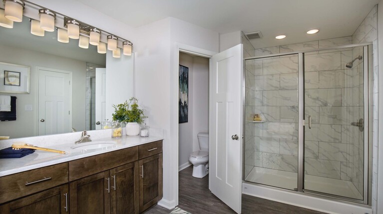 Spacious Bathroom with Double Vanity and Walk-in Shower
