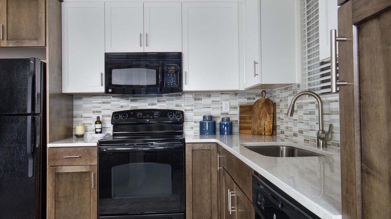 Modern Kitchen with Quartz Countertops and Custom Cabinetry