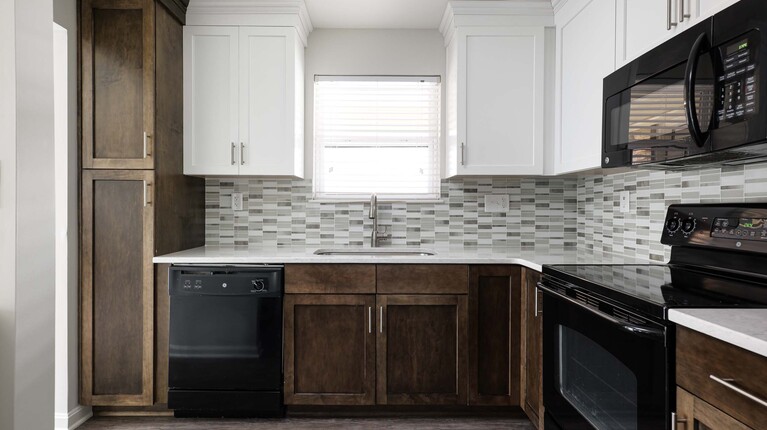 Modern Kitchen with Quartz Countertops and Custom Cabinetry