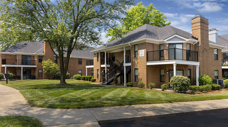 Building Exterior with Greenspace and Walkways