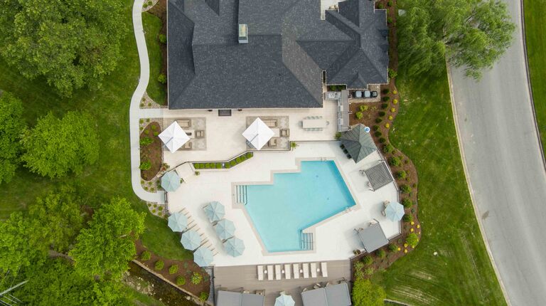 Resort-Inspired Pool with Cabanas and Entertainment Lounges 